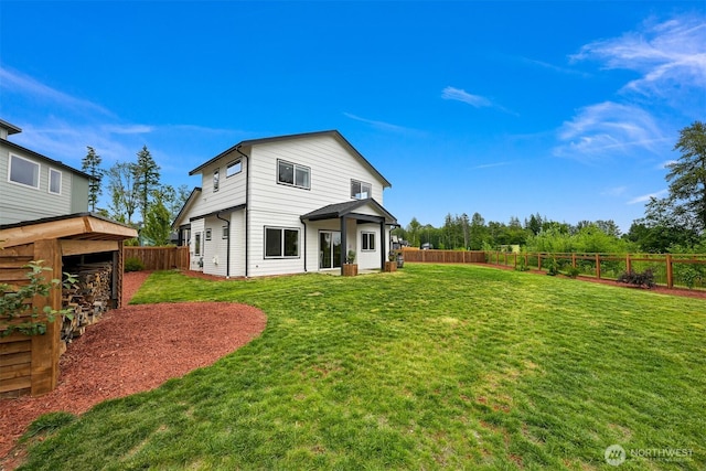 2649 Sandwood Ln, Blaine, WA 98230 - back of house with a fenced backyard and an outdoor structure
