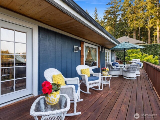 31707 W Lake Ketchum Rd, Stanwood, WA 98292 - wooden deck with outdoor dining space