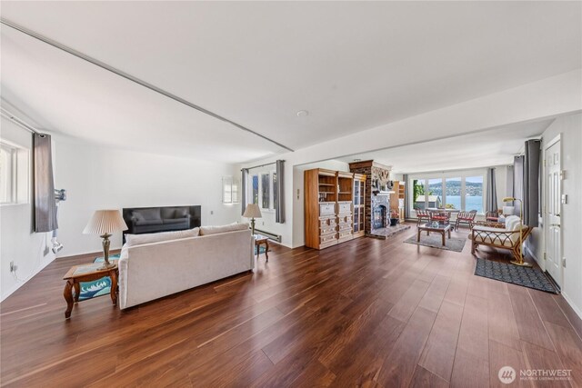 4448 S Shore Dr, Anacortes, WA 98221 - living room featuring wood finished floors and a fireplace