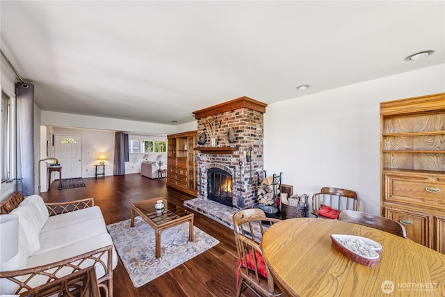 4448 S Shore Dr, Anacortes, WA 98221 - living room featuring wood finished floors and a fireplace