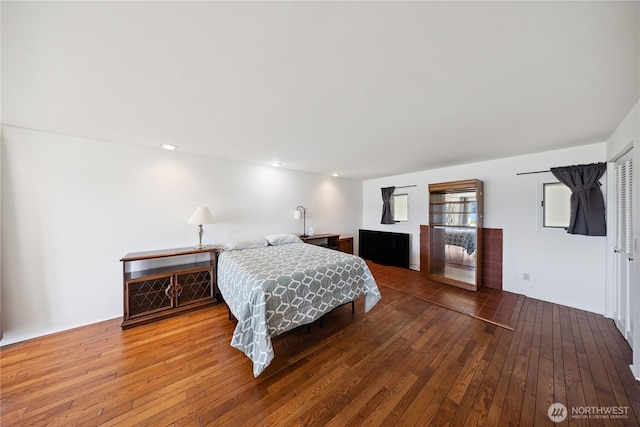 4448 S Shore Dr, Anacortes, WA 98221 - bedroom with hardwood / wood-style floors, a fireplace, and recessed lighting