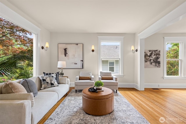 8251 Densmore Ave N, Seattle, WA 98103 - living area with healthy amount of natural light and wood finished floors