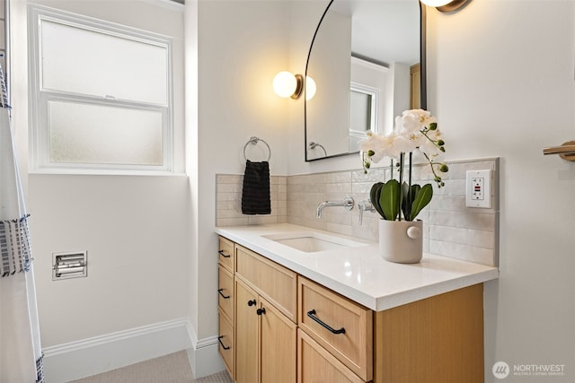 8251 Densmore Ave N, Seattle, WA 98103 - bathroom featuring tasteful backsplash and vanity