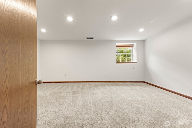 8251 Densmore Ave N, Seattle, WA 98103 - carpeted spare room featuring recessed lighting and baseboards