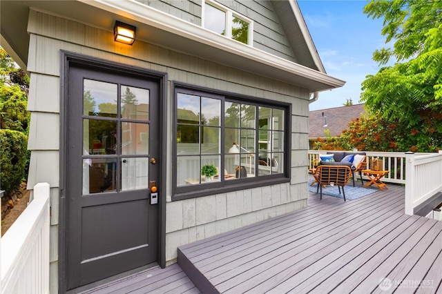 8251 Densmore Ave N, Seattle, WA 98103 - wooden deck featuring an outdoor living space