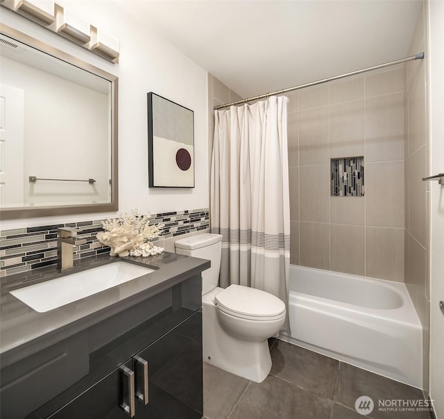 2301 Fairview Ave E Unit 301, Seattle, WA 98102 - bathroom featuring tile patterned flooring, vanity, shower / bath combo, decorative backsplash, and tile walls