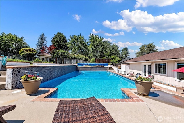 1220 SE 2nd St, East Wenatchee, WA 98802 - view of swimming pool featuring a patio area, a fenced backyard, french doors, and an outdoor hangout area