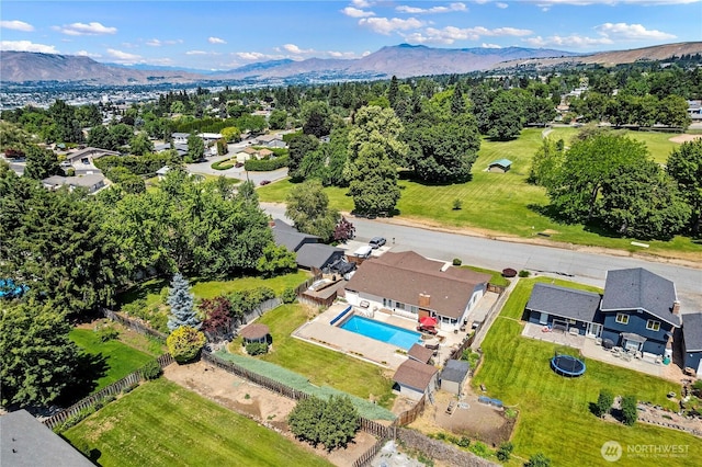 1220 SE 2nd St, East Wenatchee, WA 98802 - aerial perspective of suburban area with a mountain backdrop and a pool