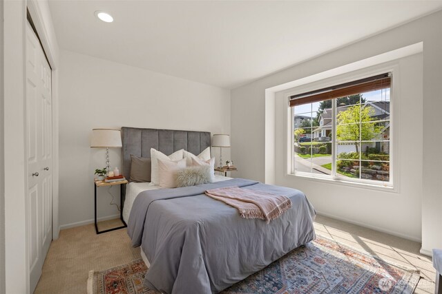 1206 S 36th Pl, Renton, WA 98055 - bedroom featuring light carpet and a closet