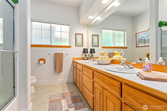 9204 Silver Lake Rd, Maple Falls, WA 98266 - bathroom with a shower with shower door, double vanity, and recessed lighting