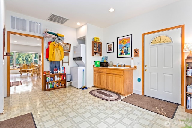 9204 Silver Lake Rd, Maple Falls, WA 98266 - entryway featuring stacked washer / drying machine, light flooring, and recessed lighting