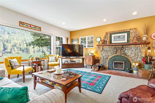 9204 Silver Lake Rd, Maple Falls, WA 98266 - living area with recessed lighting, a stone fireplace, and carpet