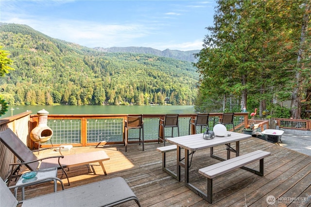 9204 Silver Lake Rd, Maple Falls, WA 98266 - wooden deck with a view of trees and a water and mountain view