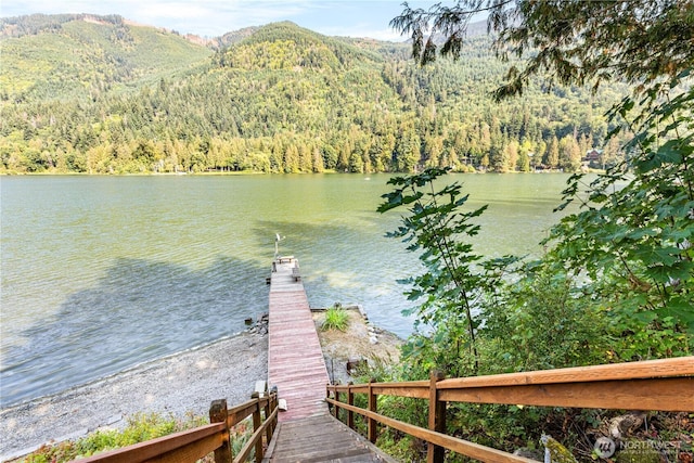 9204 Silver Lake Rd, Maple Falls, WA 98266 - dock featuring a wooded view and a water and mountain view