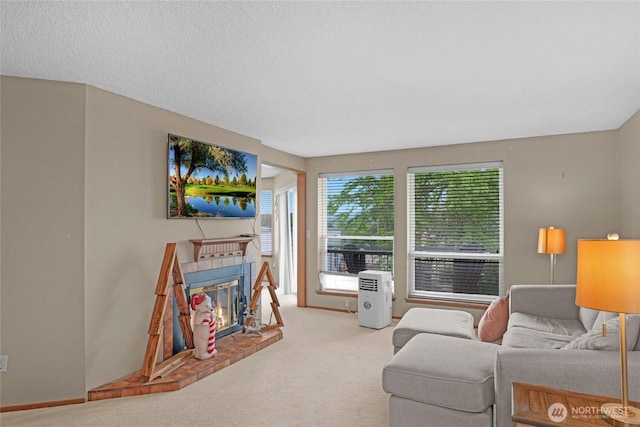 1541 Sheridan Unit C2, Bremerton, WA 98310 - carpeted living area featuring a glass covered fireplace