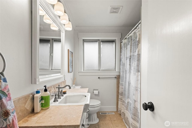 5620 N 23rd St, Tacoma, WA 98406 - bathroom with vanity, tile patterned flooring, and crown molding
