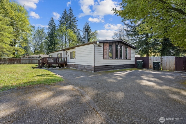 2641 Scotlac Dr SW, Olympia, WA 98512 - view of side of home with crawl space and a wooden deck