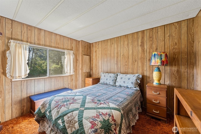2641 Scotlac Dr SW, Olympia, WA 98512 - bedroom with dark carpet, wooden walls, and a textured ceiling