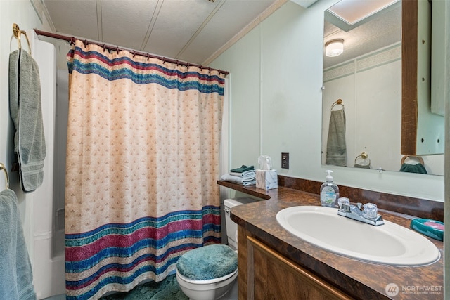 2641 Scotlac Dr SW, Olympia, WA 98512 - bathroom with vanity, ornamental molding, curtained shower, and a textured ceiling