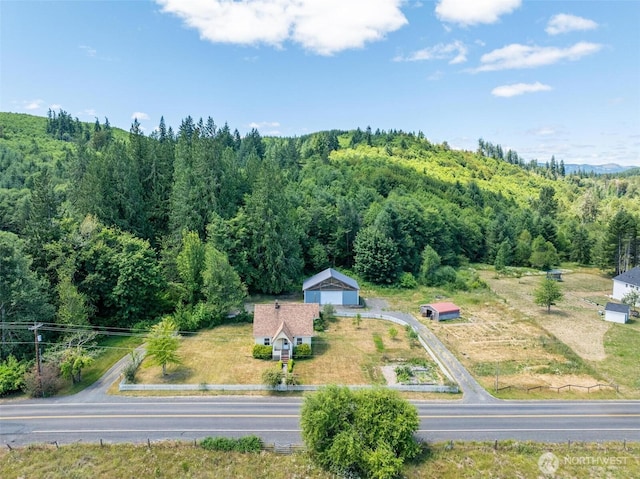 1129 Bunker Creek Rd, Chehalis, WA 98532 - aerial view of property and surrounding area with a heavily wooded area
