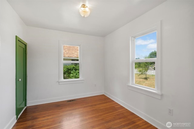 1129 Bunker Creek Rd, Chehalis, WA 98532 - unfurnished room with healthy amount of natural light and wood finished floors