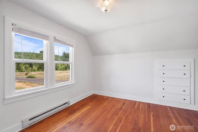 1129 Bunker Creek Rd, Chehalis, WA 98532 - bonus room with a baseboard heating unit, lofted ceiling, and hardwood / wood-style floors