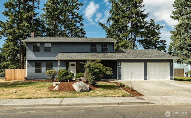 1078 NW Kitsap Ter, Oak Harbor, WA 98277 - traditional-style home with a garage, driveway, and a chimney