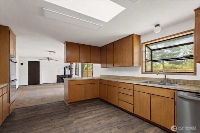 1078 NW Kitsap Ter, Oak Harbor, WA 98277 - kitchen featuring stainless steel appliances, a peninsula, plenty of natural light, and open floor plan