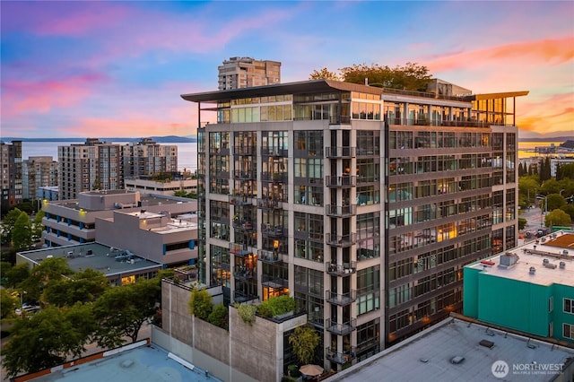2720 3rd Ave Unit 412, Seattle, WA 98121 - property at dusk with a view of city and a view of apartment building / complex
