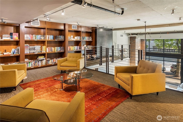 2720 3rd Ave Unit 412, Seattle, WA 98121 - sitting room featuring track lighting and carpet floors