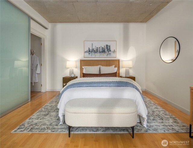 2720 3rd Ave Unit 412, Seattle, WA 98121 - bedroom featuring wood finished floors