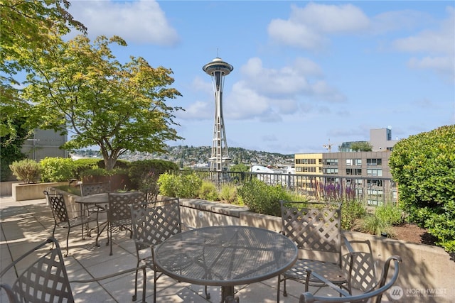 2720 3rd Ave Unit 412, Seattle, WA 98121 - view of patio / terrace featuring outdoor dining area