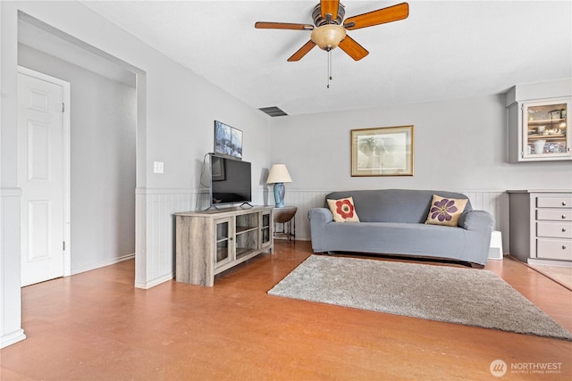 8374 W Meadow Ln, Lynden, WA 98264 - living room with ceiling fan and wainscoting
