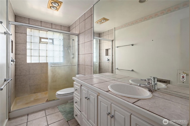 5017 Harbor Hills Dr, Freeland, WA 98249 - bathroom with tile patterned floors, a shower stall, and vanity
