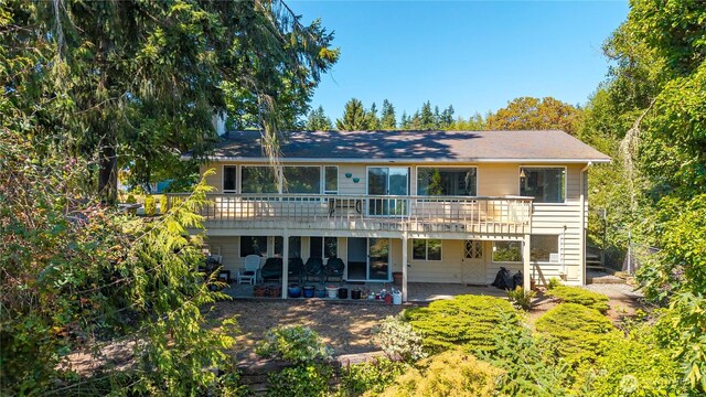 5017 Harbor Hills Dr, Freeland, WA 98249 - rear view of house with a patio and a deck