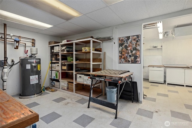 5017 Harbor Hills Dr, Freeland, WA 98249 - below grade area with tile patterned floors, electric water heater, and a drop ceiling