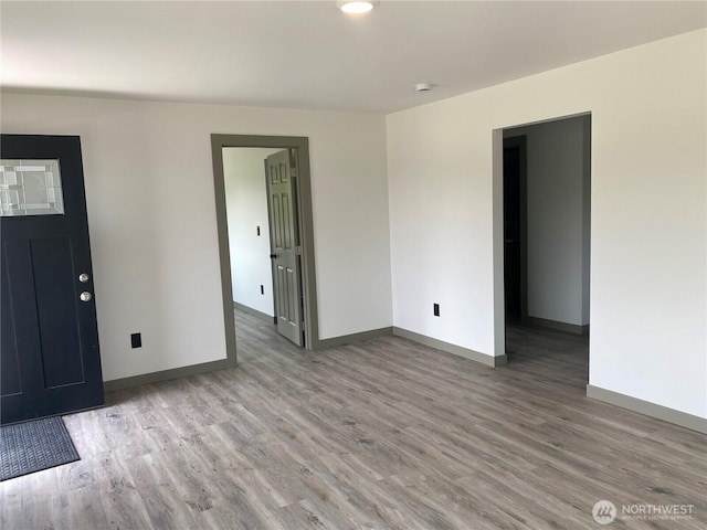 604 SW 4th St, College Place, WA 99324 - empty room with wood finished floors and a smoke detector