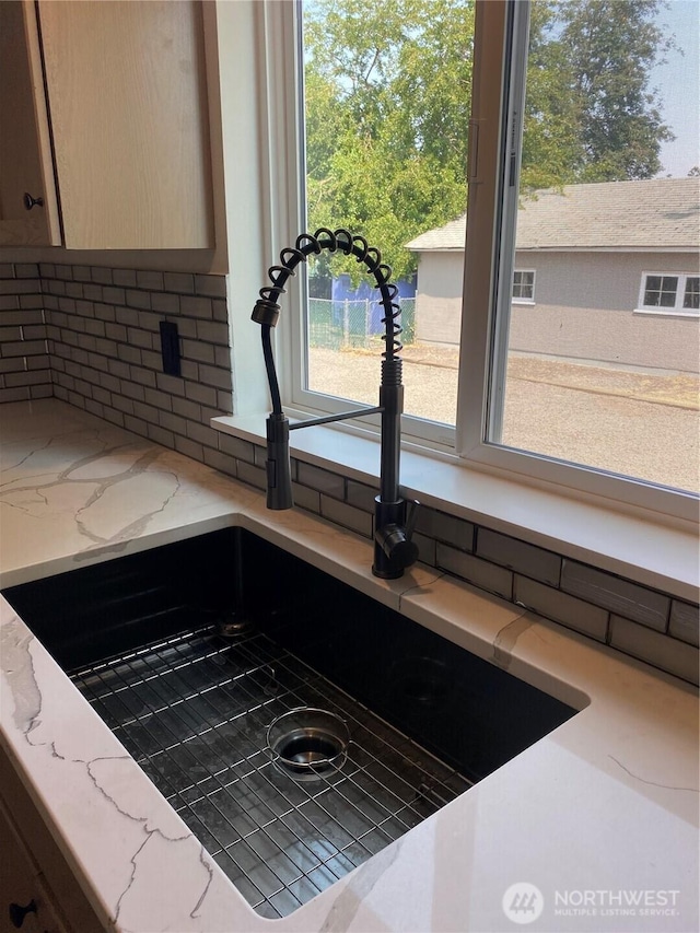 604 SW 4th St, College Place, WA 99324 - kitchen view of backsplash and light stone counters