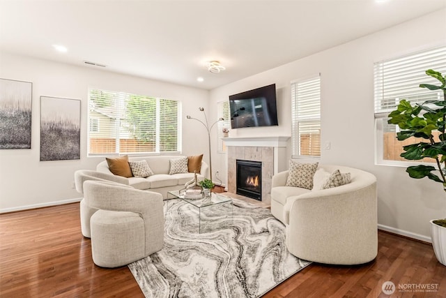 17710 39th Ave SE, Bothell, WA 98012 - living room with wood finished floors, a tile fireplace, and recessed lighting