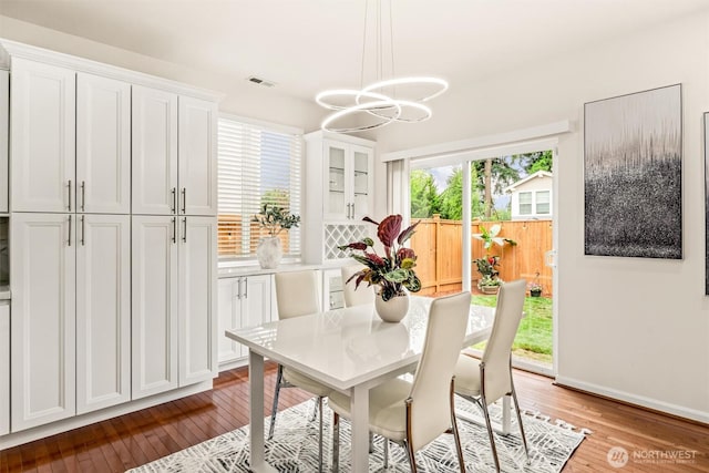 17710 39th Ave SE, Bothell, WA 98012 - dining space with a chandelier and wood-type flooring