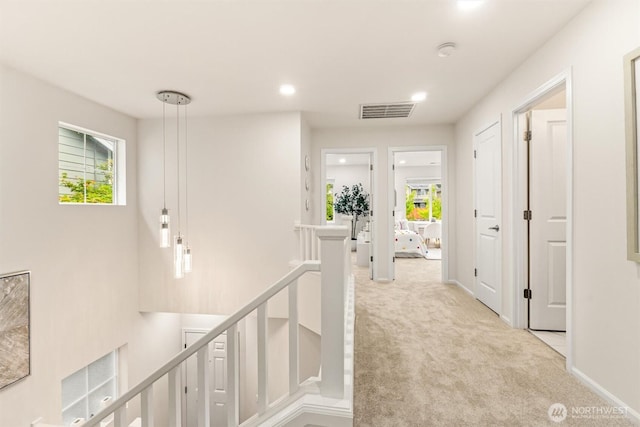 17710 39th Ave SE, Bothell, WA 98012 - corridor with light carpet, healthy amount of natural light, recessed lighting, and an upstairs landing