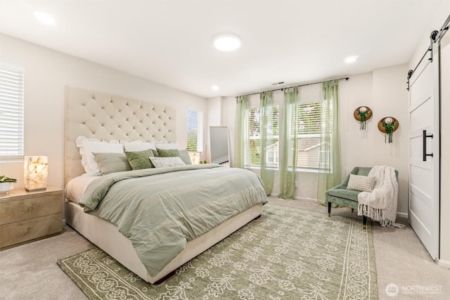 17710 39th Ave SE, Bothell, WA 98012 - bedroom featuring a barn door and light colored carpet