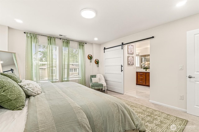 17710 39th Ave SE, Bothell, WA 98012 - bedroom featuring a barn door, light carpet, ensuite bathroom, and recessed lighting