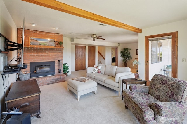 622 Vista View Pl, East Wenatchee, WA 98802 - living area with carpet, a brick fireplace, a ceiling fan, stairway, and beam ceiling
