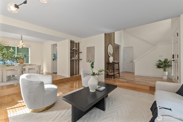 9132 NE 143rd Pl, Kirkland, WA 98034 - living area featuring light wood finished floors and a chandelier