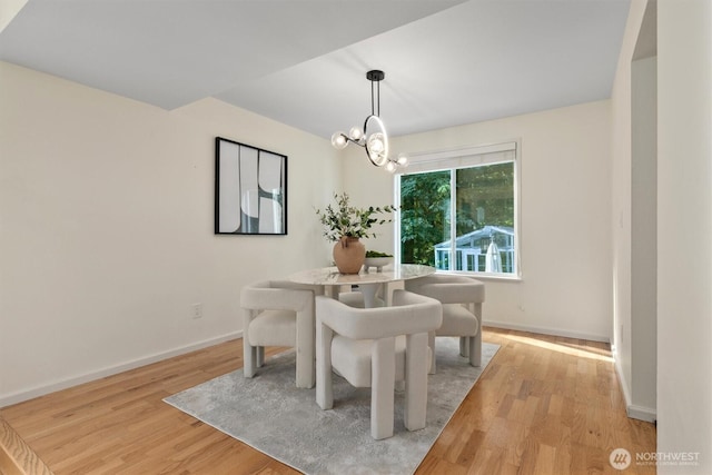 9132 NE 143rd Pl, Kirkland, WA 98034 - dining room featuring light wood-style floors and a chandelier