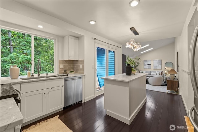 9132 NE 143rd Pl, Kirkland, WA 98034 - kitchen with dishwasher, tasteful backsplash, a chandelier, white cabinetry, and hanging light fixtures