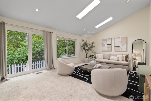 9132 NE 143rd Pl, Kirkland, WA 98034 - living area with lofted ceiling, carpet, recessed lighting, and a skylight