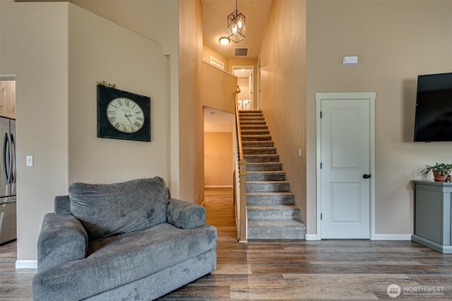 118 Bald Eagle Rd, Ariel, WA 98603 - living area with stairs, wood finished floors, and a high ceiling
