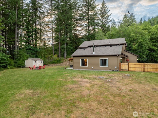 118 Bald Eagle Rd, Ariel, WA 98603 - back of property with a storage unit and a shingled roof
